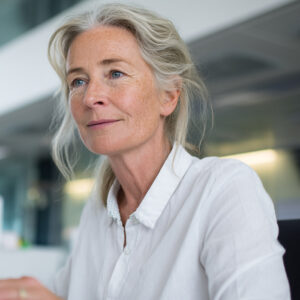 Elderly, female patient sitting