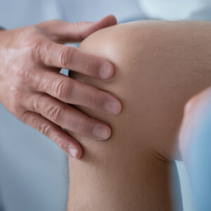 Orthopedic Doctor Examining Knee 