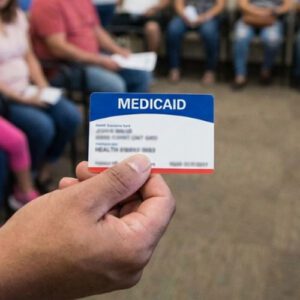Medicaid Card in hand