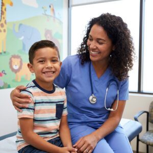 Pediatrician with Young Patient