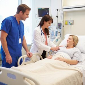 Doctors Treating Middle-aged Female Patient